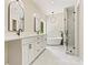 Modern bathroom featuring double vanity, large tub, glass enclosed shower, and stylish fixtures at 6249 Hayden Dr, Hickory, NC 28601