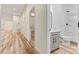 Bathroom featuring a gray vanity, a tiled shower, and modern fixtures in a naturally lit area at 6249 Hayden Dr, Hickory, NC 28601