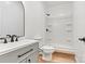 Bathroom featuring a modern vanity, sleek fixtures, and a convenient walk-in shower at 6249 Hayden Dr, Hickory, NC 28601