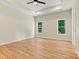 Bright primary bedroom with tray ceiling, ceiling fan and lots of natural light at 6249 Hayden Dr, Hickory, NC 28601