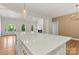 Open-concept kitchen with island perfect for entertaining next to a living room with fireplace at 6249 Hayden Dr, Hickory, NC 28601