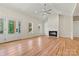 Bright living room with hardwood floors, fireplace, and ample natural light, ideal for gatherings and relaxation at 6249 Hayden Dr, Hickory, NC 28601