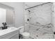 Bathroom with a marble tile shower with matte black hardware, and a coordinating vanity at 6310 Forney Hill Rd, Denver, NC 28037