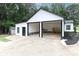 Detached two-car garage with open bays and a convenient side entrance and work area at 6310 Forney Hill Rd, Denver, NC 28037