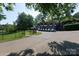 Golf carts lined up at the country club, offering convenient transportation for golf enthusiasts at 6507 Fairway Point Dr, Charlotte, NC 28269