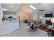 Bright open concept living space with seamless flow between living, dining, and kitchen areas creating an inviting atmosphere at 6507 Fairway Point Dr, Charlotte, NC 28269