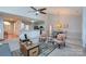 Bright, airy living area showcasing stylish furnishings and an open layout perfect for modern living at 6507 Fairway Point Dr, Charlotte, NC 28269