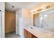 The bathroom features a single sink vanity and tub with shower at 6922 Brandon Chase Ln, Concord, NC 28025