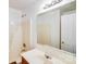 Bathroom featuring a sink, mirror, and a shower with a white tub at 6922 Brandon Chase Ln, Concord, NC 28025