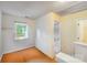Bedroom with a window providing natural light and a glimpse of the outdoors at 6922 Brandon Chase Ln, Concord, NC 28025