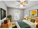 Cozy bedroom featuring natural light, stylish decor, and comfortable furnishings at 6922 Brandon Chase Ln, Concord, NC 28025