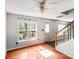 Bright living room features hardwood flooring, neutral paint, and natural lighting at 6922 Brandon Chase Ln, Concord, NC 28025