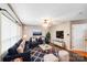 Comfortable living room furnished with plush seating, stylish decor, and a modern television at 6922 Brandon Chase Ln, Concord, NC 28025