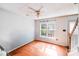 Bright living room features hardwood flooring, neutral paint, and natural lighting at 6922 Brandon Chase Ln, Concord, NC 28025