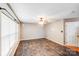 Spacious living room features a tiled floor, neutral paint, and a bright window at 6922 Brandon Chase Ln, Concord, NC 28025