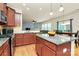 Open-concept kitchen features granite counters and stainless steel appliances at 6961 Liverpool Ct, Fort Mill, SC 29707