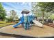 Community playground featuring a colorful playset with slides and climbing structures for children to enjoy at 6961 Liverpool Ct, Fort Mill, SC 29707