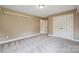 Neutral bedroom with closet and neutral walls and carpet at 8137 Caliterra Dr, Charlotte, NC 28227