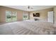 Spacious bedroom with carpet, great natural light, and a mounted television at 8137 Caliterra Dr, Charlotte, NC 28227