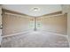 Bright bedroom with carpet and neutral paint, ready for personalization at 8137 Caliterra Dr, Charlotte, NC 28227
