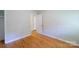 Bedroom featuring hardwood floors and a view through the door to another room at 823 Yuma St, Charlotte, NC 28213
