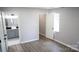 Bedroom view that leads into bathroom with modern sink and marbled shower at 830 Mcarthur Ave, Charlotte, NC 28206