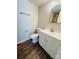 Bathroom with a white vanity, a modern sink faucet, and a tiled shower reflected in the mirror at 9541 Shannon Green Dr, Charlotte, NC 28213