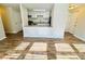Open living space with a view of the kitchen and wood-style flooring at 9541 Shannon Green Dr, Charlotte, NC 28213