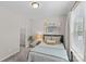 Cozy bedroom with a comfortable bed, natural light, and neutral décor at 9620 Ainslie Downs St, Charlotte, NC 28273