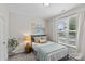Inviting bedroom with soft carpet, window, and stylish decor at 9620 Ainslie Downs St, Charlotte, NC 28273