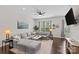 The living room is bathed in natural light at 9620 Ainslie Downs St, Charlotte, NC 28273