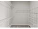 Organized walk-in closet with ample shelving for storage at 9620 Ainslie Downs St, Charlotte, NC 28273