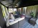 Relaxing gazebo features ample seating, a table, a bar, and a tranquil outdoor space at 9792 Ravenscroft Nw Ln, Concord, NC 28027