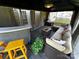 Inviting outdoor space featuring a gazebo with comfortable seating, bar, and views of the backyard at 9792 Ravenscroft Nw Ln, Concord, NC 28027