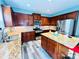 Updated kitchen features granite countertops, stainless steel appliances and a center island at 9792 Ravenscroft Nw Ln, Concord, NC 28027