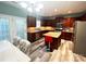 Modern kitchen with stainless steel appliances, granite countertops, and center island at 9792 Ravenscroft Nw Ln, Concord, NC 28027