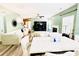 A spacious living room area features modern furniture and wood flooring at 9792 Ravenscroft Nw Ln, Concord, NC 28027
