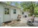 Relaxing backyard space with outdoor seating, string lights, and a well-maintained patio at 1006 Home Trl, Gastonia, NC 28052