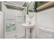 Bathroom featuring a glass shower, pedestal sink, toilet and light green decor at 1006 Home Trl, Gastonia, NC 28052