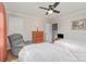 The bedroom has two twin beds, a gray armchair, and a wooden dresser by the door at 1006 Home Trl, Gastonia, NC 28052