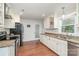 Well-appointed kitchen featuring granite counters and stainless steel appliances at 1006 Home Trl, Gastonia, NC 28052