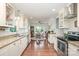 Spacious kitchen with granite countertops and a view of the dining area at 1006 Home Trl, Gastonia, NC 28052