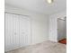This bedroom has carpet, a light, and double-door closets for ample storage at 1011 Atherstone Nw St, Conover, NC 28613
