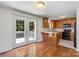 Bright kitchen and dining area featuring access to a back deck at 1011 Atherstone Nw St, Conover, NC 28613