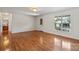 Bright living room with hardwood floors and a view of the exterior at 1011 Atherstone Nw St, Conover, NC 28613