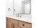 Bathroom showcasing a double sink vanity with modern fixtures and elegant design at 1011 Sandy Ct, Gastonia, NC 28056