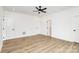 Spacious bedroom with wood flooring, multiple doors, and ample natural light for a welcoming feel at 1011 Sandy Ct, Gastonia, NC 28056