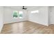 Bedroom with abundant sunlight, recessed lighting, and luxury vinyl plank flooring, creating a bright space at 1011 Sandy Ct, Gastonia, NC 28056