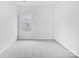 Bright bedroom with neutral carpet, white walls, and a window at 10328 Kempsford Dr, Charlotte, NC 28262