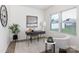 This office features a patterned desk, a neutral chair, and natural light at 1108 Millbridge Rd # 110, Belmont, NC 28012